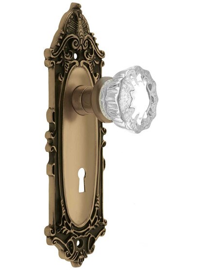 Largo Design Mortise Lock Set With Fluted Crystal Door Knobs in Antique Brass.